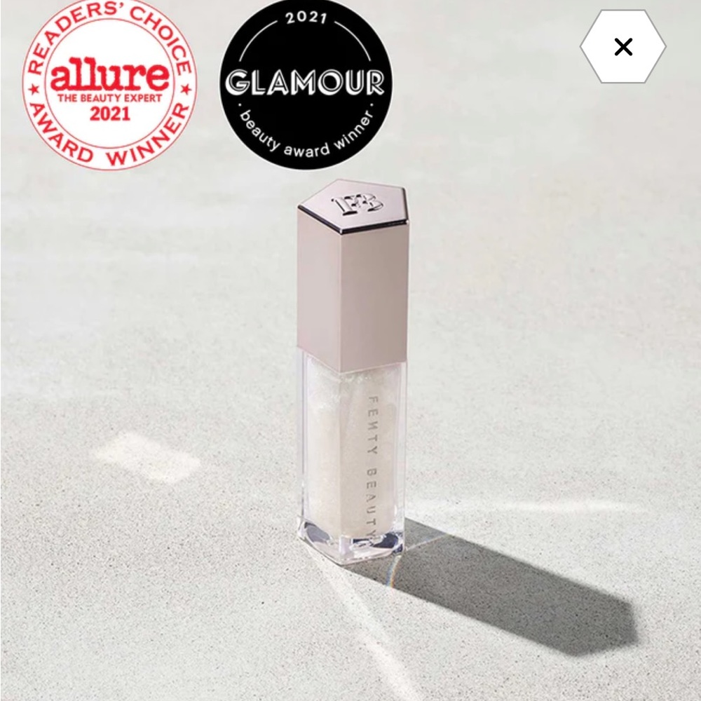 ADDICTIVE SHINE,NOURISHING WEAR. 
Fenty Milk Lipgloss (shimmering pearl) LIMITED